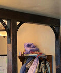 Heavy Duty Shelf Brackets Set Of 2 16 By 12 Inch 1100 Lbs Max Load Rustproof Die Cast Alloy Mantel Brackets For Ultra Strong Wood Shelves Supports 16 To 24 Inch Deep Shelves 90 Degree Mount installed under wooden beam supporting a shelf