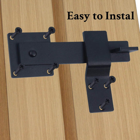 Six Inch Heavy Duty Barn Door Flip Latch With 360 Degree Rotatable Gate Lock installed on wood, matte black steel finish.