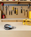 Stainless Steel Nylon Pulley Wheel Swivel Block 209kg Bearing Single Pulley on workshop table with tools in background
