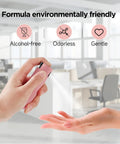 Person spraying All In One Screen Cleaner Kit With Spray And Wipe Pocket Size Lipstick Style in a modern office environment.