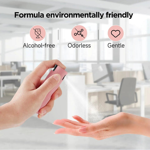Person spraying All In One Screen Cleaner Kit With Spray And Wipe Pocket Size Lipstick Style in a modern office environment.