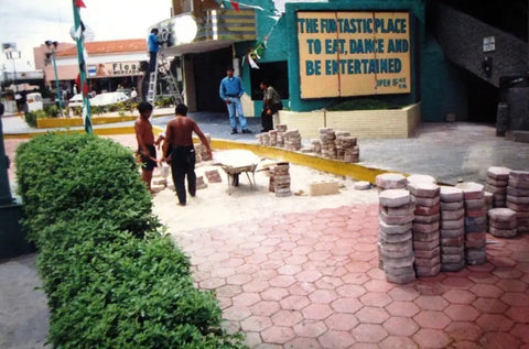 Outdoor walkway with stacked hexagonal pavers resembling Six Hexagon Concrete Molds For DIY Driveway Or Patio Pavers, 9 By 9 By 2.5 Inches Thick, Made From Rubberized ABS Plastic, Reusable Hundreds Of Times, Cast Pavers For Pennies, Durable For Outdoor Driveways And Walkways.