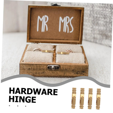 Brass Barrel Concealed Jewelry Box Hinges 4x20mm on wooden box labeled 'Mr Mrs' with gold rings displayed.