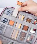 Inside view of Travel Ready Watch Band Organizer Case With Waterproof Nylon Zipper Closure, holding multiple watch bands in a mesh pocket.