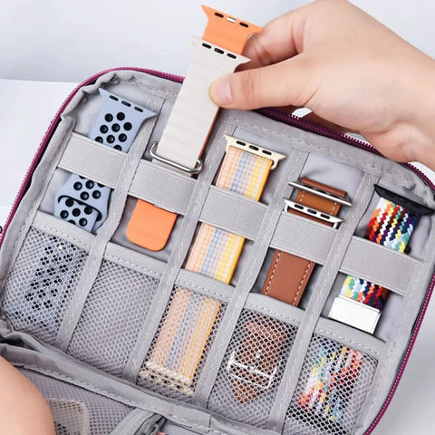 Inside view of Travel Ready Watch Band Organizer Case With Waterproof Nylon Zipper Closure, holding multiple watch bands in a mesh pocket.