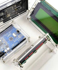 Crystal Clear Acrylic Enclosure Kit For Arduino Mega 2560 R3 Modules showing laser-cut 2.5mm thick case with reset button in middle