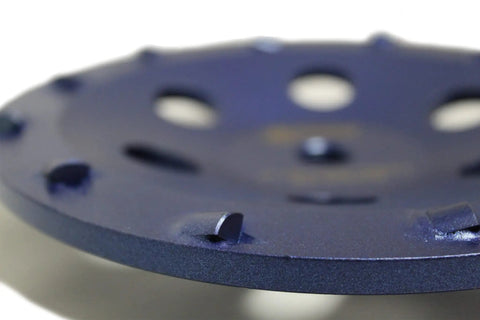 Close-up of Non Threaded 7 Inch 12 Segment PCD Concrete Grinding Cup Wheel For Heavy Duty Grindin Surface Prep And Coating Removal