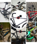 Wall Mount Bike Repair Stand for Garage Tinkering and DIY Tuneups with multiple bikes mounted, showing 180-degree rotating clamp in use.