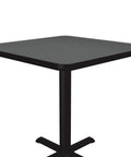 30-Inch Square Bar Table For Cafes And Break Rooms With 29-Inch Tall Height, Montana Granite Top, Black Cast Iron X Base, corner view