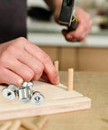Pro Grade Dowel And Tenon Center Transfer Plugs For Precision Woodworking used in alignment with wooden dowels.