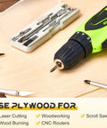 Cordless green drill with chuck and bit, next to a white drill-bit case and hobby blades on a wooden work surface