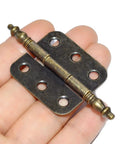 Top Shelf Vintage Folding Hinges With Screws Rock Solid Antique Bronze Zinc Alloy Hardware For Diy Projects Wooden Crates Cabinets And Keepsake Cases Easy Peasy Install And Dang Fine Finish in hand showing detail.