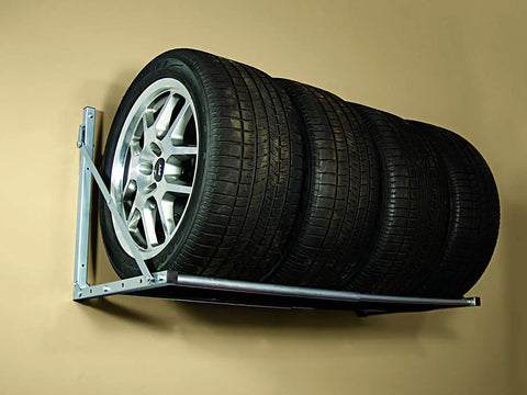 Silver Wall Mounted Folding Tire Storage Rack, 32 To 48 Inch Wide, Holds Up To 300 Lbs, Space Saving Garage Organizer with tires