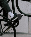 1 Pair Kids Bike Toe Clips And Pedal Straps Set Adjustable Footrests Anti Slip Straps installed on a bike in use
