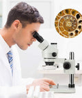 Trinocular Stereo Zoom Microscope With 56 Bulb LED Ring Light 3.5X To 90X Magnification WF10X Eyepieces 0.7X To 4.5X Zoom Objective 0.5X And 2.0X Additional Objectives Table Pillar Stand Pro Grade Lab Gear For Researchers And Gemologists, with researcher viewing sample