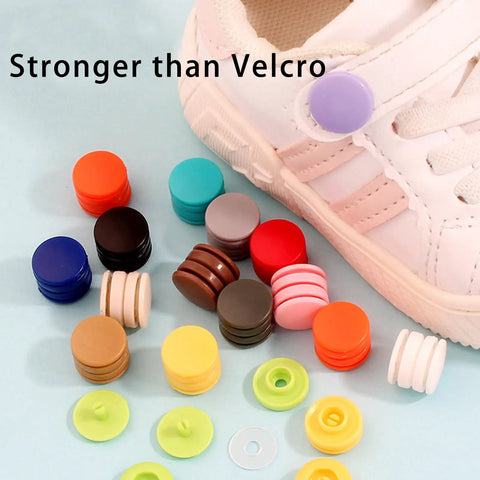 Assorted T5 plastic snap buttons in 14 colors next to a shoe, showcasing 120 Sets T5 Plastic Snap Buttons No Sew No Tools Required Hand Press Fasteners For DIY Crafts Grab And Go Clothing Repair And Home Decor 14 Color Options Durable Eco Friendly Resin.