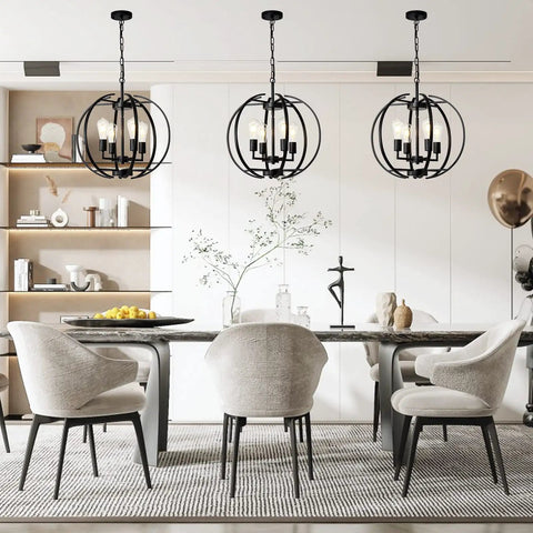 Dining room with three large lantern globe black chandeliers for farmhouse vibe, four light pendant ceiling fixture view.