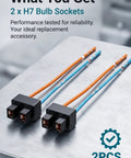 Two Pack H7 Headlight Wiring Harness With Female Wire Connector Pigtail Kit featuring pure copper terminals and sockets on a table.