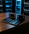 Rock Solid 1U Adjustable Rack Mount Pair For 19 Inch Server Cabinets Heavy Duty Steel Brackets with slotted ears on wooden table.