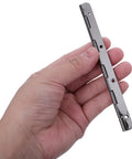 Hand holding a 5 inch black piano hinge from the 2 Piece Heavy Duty Stainless Steel Piano Hinge 5 Inch Black Tough As Nails cabinet hardware.