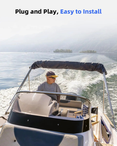 Person driving a modern boat on a lake demonstrating Marine Cable Boot Waterproof Rubber Sleeve For Boat Transom Steering And Fuel Lines With 4.7 Inch Outer Diameter And 3.2 Inch Inner Diameter Two Pack Durable Sealing Cover All Weather For Boats And Vessels With A Tight Fit And Leak Proof Seal.