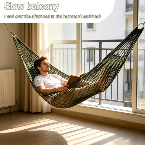 Man relaxing in breathable mesh hammock with nylon net for easy setup rope style hang loose outdoors 98 x 31.5 inches olive green