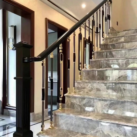 Built Tough Adjustable Stair Railing Spindles And Deck Balusters Made From Wrought Iron With Rust Proof Coating Great For Interior Steps Exterior Landings Featuring Flexible Mounting Brackets And Crisp Black Gold Modern Columns 10 Pack installed in an elegant stairway.