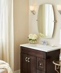 Bathroom with Dartmoor Chrome Two-Handle Centerset Bathroom Sink Faucet, dope chrome finish on white pedestal sink.