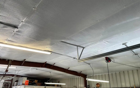 Built Tough 4x180 Feet White Vapor Barrier Tape Heavy Duty Waterproof used on a ceiling to seal insulation and prevent moisture.