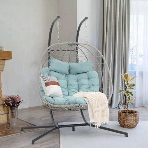 Two Person Egg Swing Chair With Stand For Indoor And Outdoor Patio Wicker Rattan Hanging Chair with cushion, light blue, in living room.