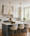 Karjearl Gold Pendant Lights Kitchen Island, 12.2" Linen Drum Chandelier above a modern kitchen island with stools.