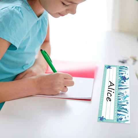 60 Pack Ocean Themed Sea Animal Name Tag Stickers For Back To School Marine Life Adhesive Labels featuring "Alice" design on desk