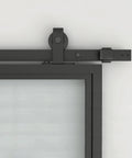 Close-up of 30 Inch By 84 Inch Frosted Glass Barn Door With Black Steel Frame And Three Quarter Lite Panels Ships Fully Preassembled