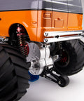 80mm RC Oil Filled Shock Absorber Kit for One Tenth Scale Crawlers mounted on off-road vehicle, grey aluminum bodies visible