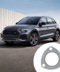 Automotive exhaust flange gasket, 2.5-inch, 3-bolt, high-temp graphite; shown beside a gray SUV.