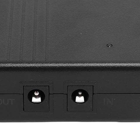 Close-up of input and output ports on Solid 7800mAh UPS Power Supply For Router And Modem Backups delivering steady 24 Watts.