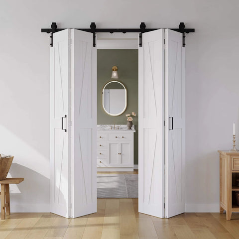 Space Saving White Bifold Sliding Barn Door Kit 60x84 Inch With K Shaped Panel And Sliding Hardware installed in a bedroom