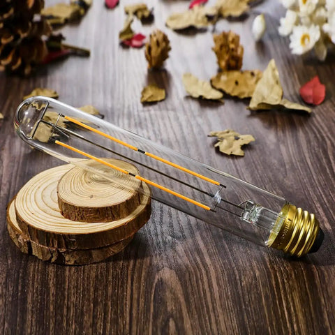 Dimmable E26 LED Light Bulb 6W Equal 60W Incandescent on a wooden surface with decorative elements, focus on bulb details.
