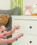 Child opening dresser with Bee and Flowers Round Cabinet Knobs Set of Four 1.37 Inch Black Kitchen Cupboard Handles Glass and ABS