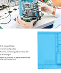 Heat Resistant Silicone Soldering Mat With Anti Static Magnetic Repair Station for cell phones laptops watches shown with motherboard