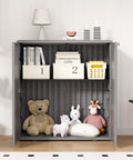 Front view of Beefy Outdoor Storage Cabinet With Doors And Shelf Grey Weatherproof HDPE Resin Box, 34x15x36 inches, storing various items.