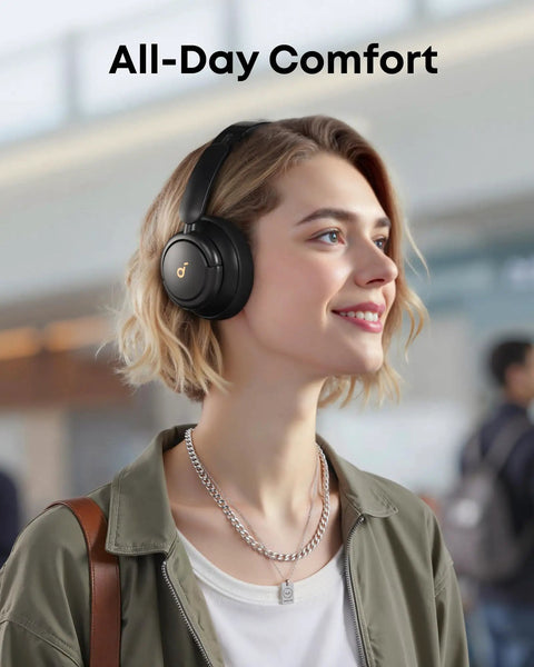 Person wearing Hybrid Active Noise Canceling Headphones With Custom EQ Via App Multiple Modes Hi Res Audio And 50 Hour Battery Life Bluetooth Multipoint Connection Comfortable Fit For Travel And Everyday Use