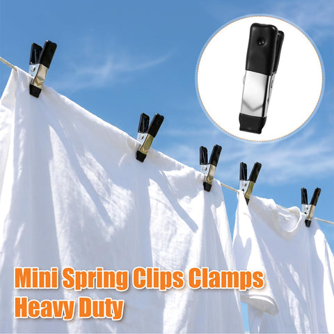 Clothes secured by 2-Inch Heavy-Duty Metal Spring Clamps Set With Non-Slip Rubber Tips under clear sky