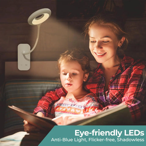 Clip On Reading Light For Bed Headboard With Rechargeable Battery USB C Charging Five Color Options And Five Brightness Levels Flexible Neck LED Night Lamp Eye Protect Desk Light For Kids And Dorm illuminating a child reading with a parent.