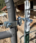 Close-up of Heavy Duty T Post Gate Hinge Pins Built Tough For Farm Gate Garden Fence And Backyard Gate Steel Silver Pins Installed