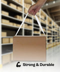 No Frills Clear Packing Tape Two Point Five Mil Thick One Point Eight Eight Inches Wide Six Pack Machine Length Rolls Heavy Duty Adhesive Carton Sealer holding a packed box.