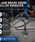 Beefy Three Jaw Brake Drum Puller with Adjustable Arms and Four Caster Legs for Cars and Trucks in workshop setting