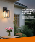 Two Pack Automatic Dusk To Dawn Exterior Wall Lights With Smart Photo Sensor Waterproof Black Coach Porch Fixture mounted on exterior wall.