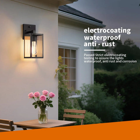 Two Pack Automatic Dusk To Dawn Exterior Wall Lights With Smart Photo Sensor Waterproof Black Coach Porch Fixture mounted on exterior wall.