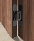 Close-up view of Heavy Duty Hydraulic Buffer Hinge With Invisible Hidden Spring for Automatic Soft Close, installed on wooden doors.